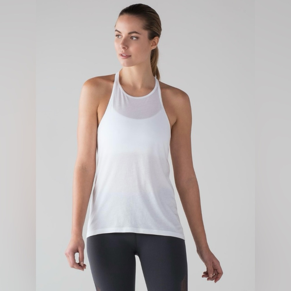 Lululemon trapeze racer back in white. New with tags. Size 2.